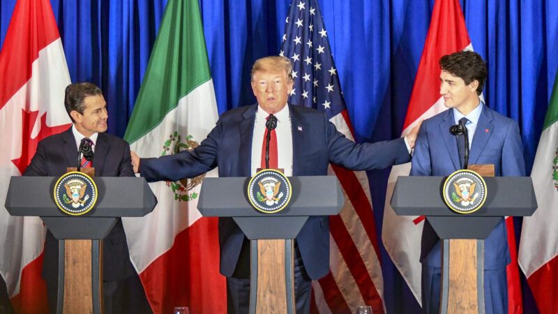 Trump at podium with Canadian Prime Minister Justin Trudeau and Mexican leader Enrique Pena Neto | Ron Przysucha/ZUMA Press/Newscom