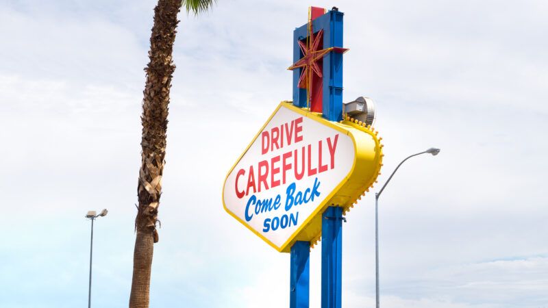 The back of the sign at the entrance to Las Vegas, Nevada, reading "Drive Carefully, Come Back Soon" | Tero Vesalainen | Dreamstime.com