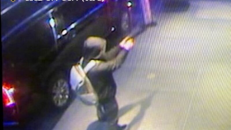 An image of Luigi Mangione with a gun and the Crime Stoppers logo and phone number in the upper left corner |  NYPD/ZUMAPRESS/Newscom