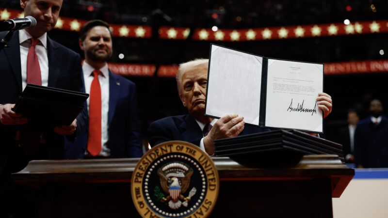 President Trump holding signed executive order up as Vice President Vance looks on | Anna Moneymaker - Pool via CNP/Polaris/Newscom