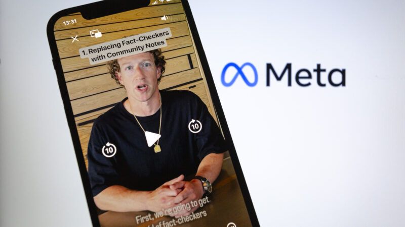 A smartphone depicts Mark Zuckerberg in a video, with the caption "1. Replacing Fact-Checkers with Community Notes" on top and "First, we are going to get rid of fact-checkers" on the bottom. The Meta logo, with the blue infinity symbol, is in the background. | Andre M. Chang/ZUMAPRESS/Newscom