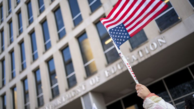 An American flag waving outside the Department of Education | BONNIE CASH/UPI/Newscom