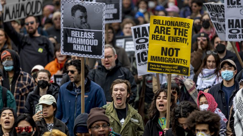 Protesters carry signs in support of releasing Mahmoud Khalil | Michael Nigro/ZUMAPRESS/Newscom