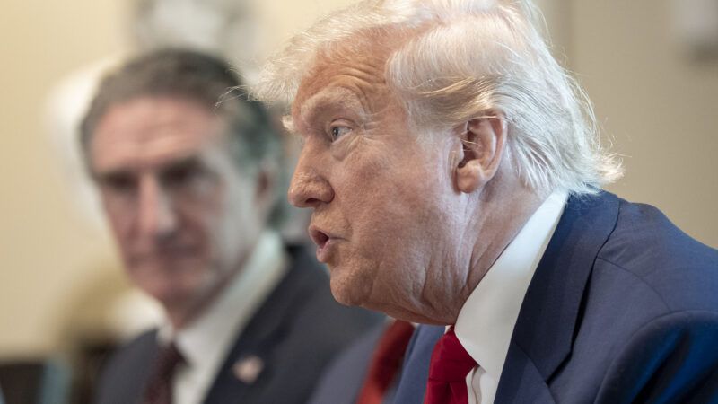 President Trump sits next to Secretary of the Interior Doug Burgum | Sipa USA/Newscom