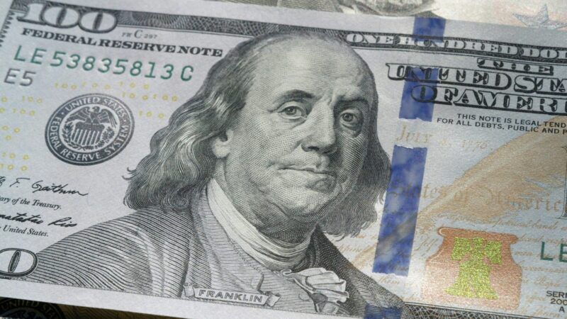 A one hundred dollar bill | Photo by Colin Watts on Unsplash