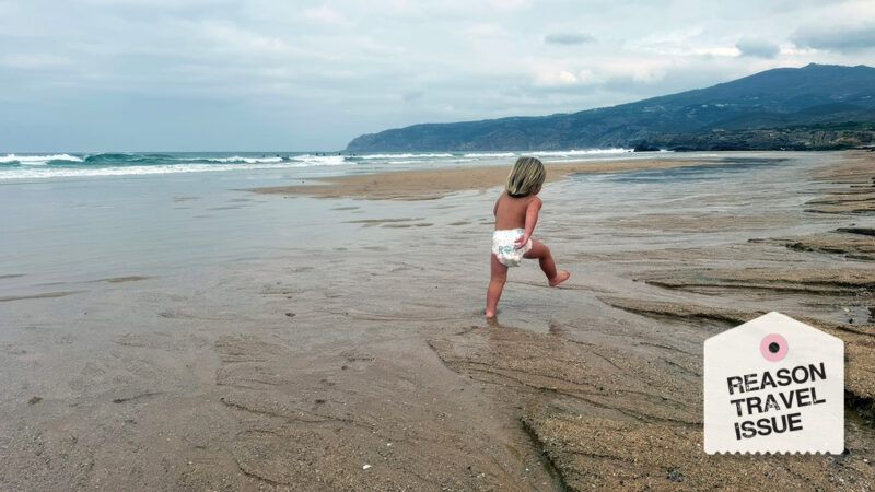 A small child walks along a beach | Photo: Courtesy of Liz Wolfe