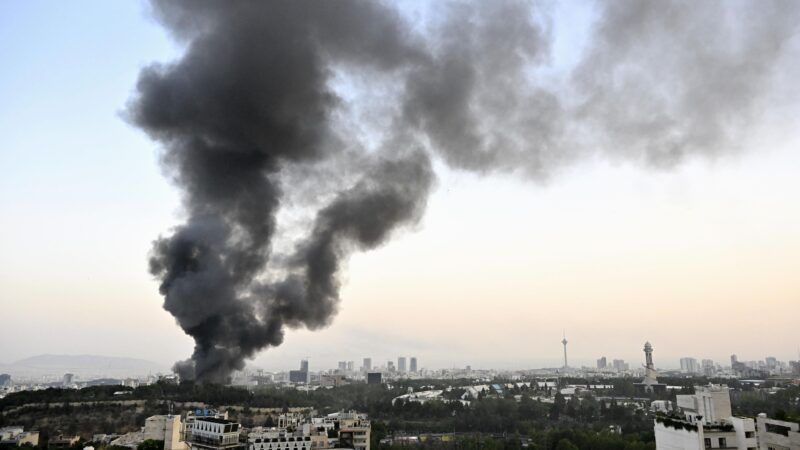 Smoke billowing over Tehran, Iran |  Kyodo/Newscom