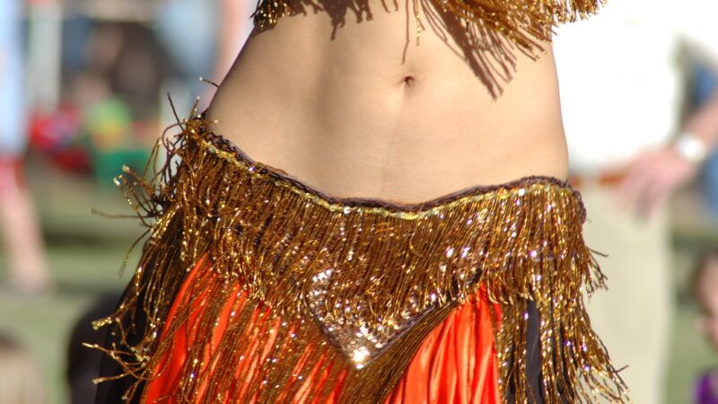 A belly dancer's exposed midriff. | Patrick Bronson | Dreamstime.com