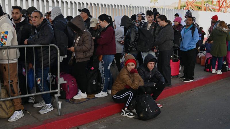 Numerous migrants line up at a checkpoint along the U.S.–Mexico border. | Carlos A. Moreno/ZUMAPRESS/Newscom