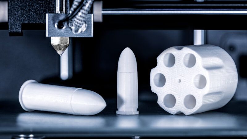3D printed cartridges and a revolver drum | Miriam Doerr | Dreamstime.com