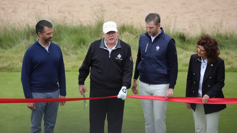 Donald Trump cutting a ribbon at a golf course | HUGO PHILPOTT/UPI/Newscom