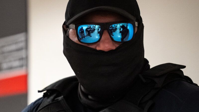 masked ICE agent | ANGELINA KATSANIS/UPI/Newscom