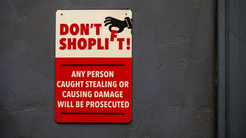 A sign that says "Don't Shoplift! Any person caught stealing or causing damaged will be prosecuted." | Heide Pinkall | Dreamstime.com