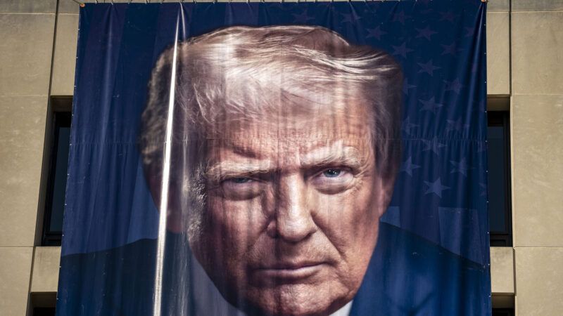 A Labor Day banner featuring President Donald Trump's face | Bonnie Cash/UPI/Newscom