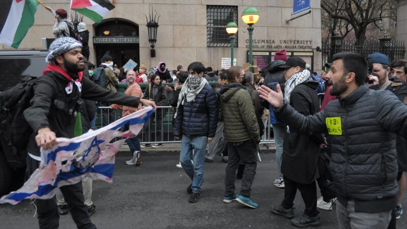 2 campus protesters clashing at Columbia University | Jimin Kim/ZUMAPRESS/Newscom