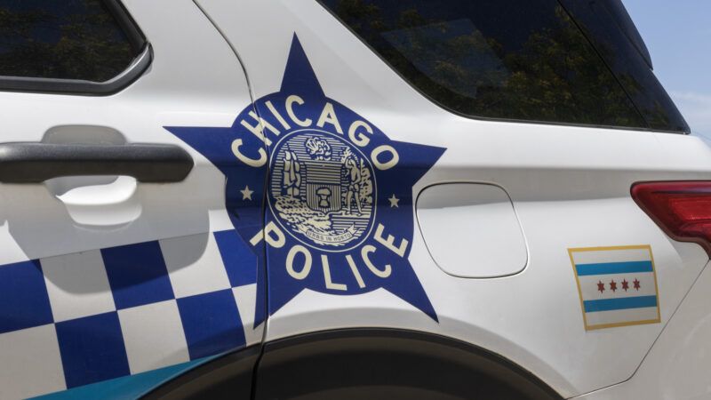 Chicago Police Department badge decal on the back of a police SUV. | Jonathan Weiss | Dreamstime.com