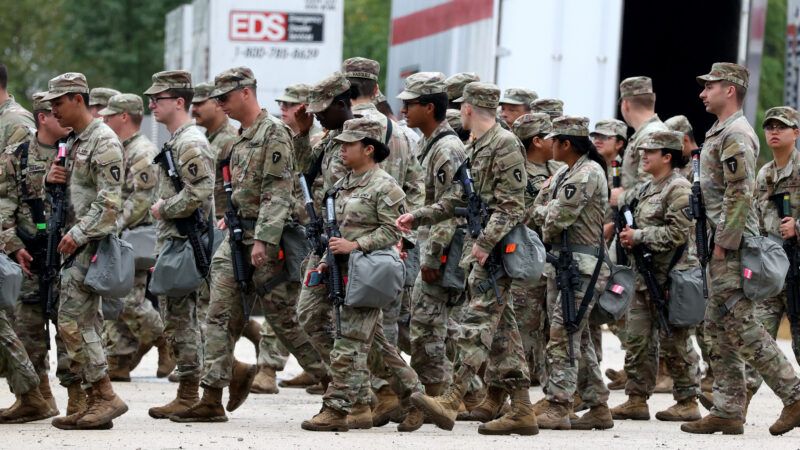 Members of the Texas National Guard assemble in Elwood, Illinois, at the Army Reserve Training Center in the southwest suburb of Chicago. |  Brian Cassella/TNS/Newscom