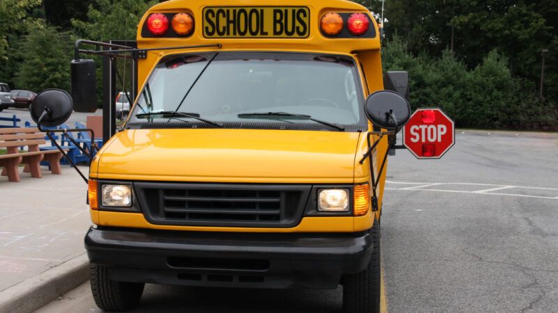 A yellow school bus or van. | Mariebm56 | Dreamstime.com