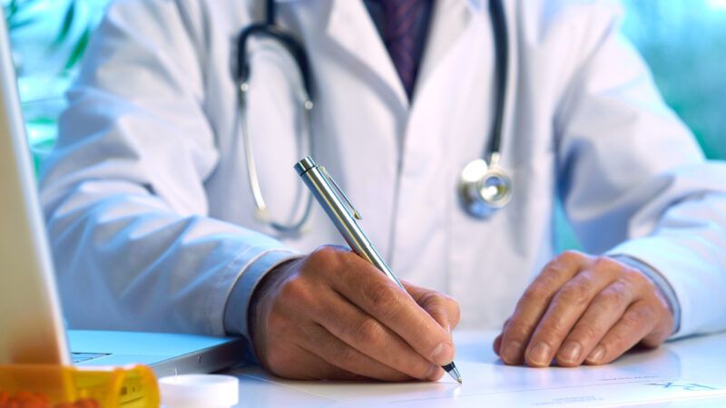 Doctor writing perscription | ID 22775215 ©  18percentgrey | Dreamstime.com