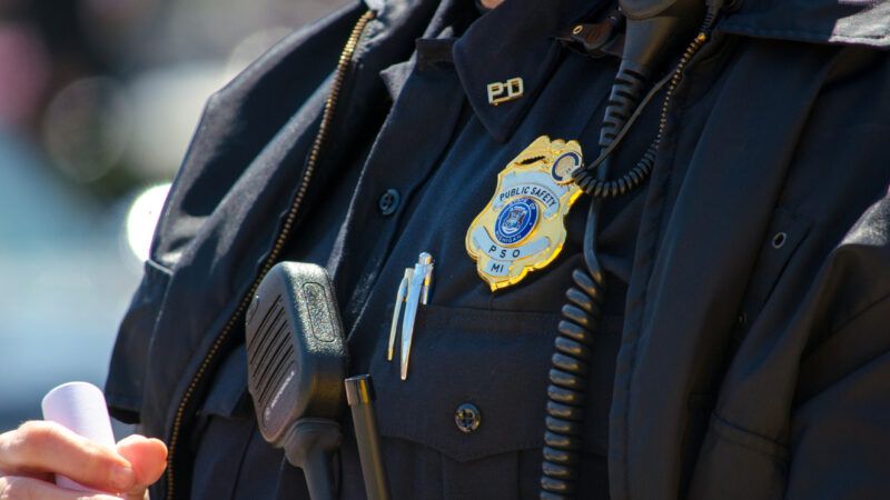 Police officer with badge and uniform. | ID 43687305 © Susan Sheldon | Dreamstime.com