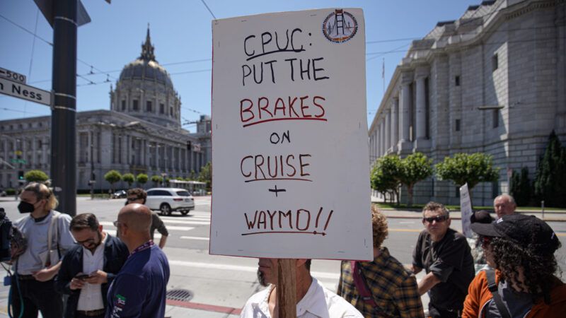 Anti-driverless car protest sign | Michael Ho Wai Lee/ZUMAPRESS/Newscom