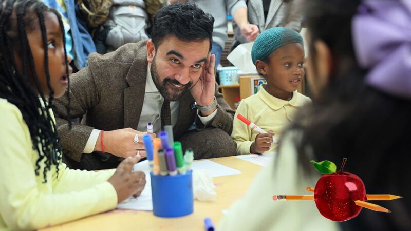 Zohran Mamdani sitting with small children in a classroom | Michael M. Santiago/Getty Images