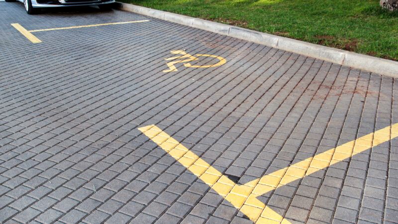 Disabled parking bay | ID 110823852 ©  Zoran Milisavljevic | Dreamstime.com