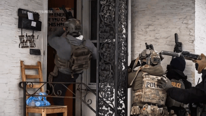 A still from the video showing immigration agents entering a home without a warrant | Photo: The Associated Press