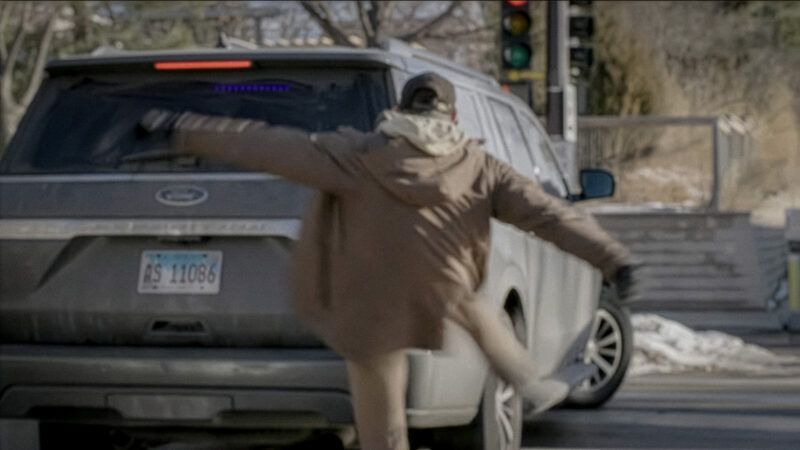 Alex Pretti kicking a federal agent's car | NBC News