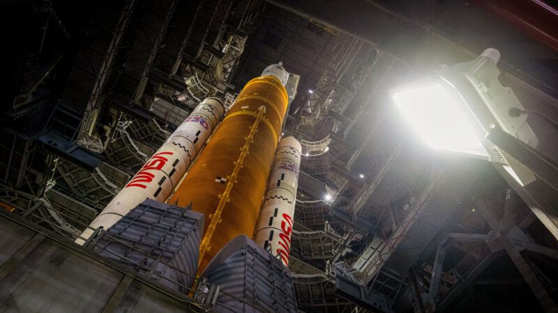 NASA's Artemis II Space Launch System rocket and Orion spacecraft are pictured from below, rising up at a diagonal angle. | IMAGO/Joel Kowsky / NASA via CNP /MediaPunch/IMAGO/MediaPunch/Newscom