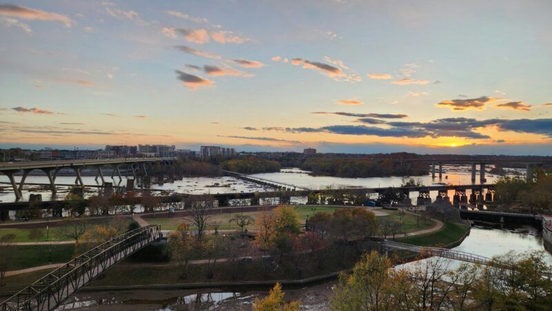 A variety of bridges cross each other and over waterways in Richmond, Virginia. | Photo by <a href="https://unsplash.com/@sullishe?utm_source=unsplash&utm_medium=referral&utm_content=creditCopyText">Shelby</a> on <a href="https://unsplash.com/photos/a-view-of-a-river-with-a-bridge-in-the-background-Q6VBwLZXvFg?utm_source=unsplash&utm_medium=referral&utm_content=creditCopyText">Unsplash</a>