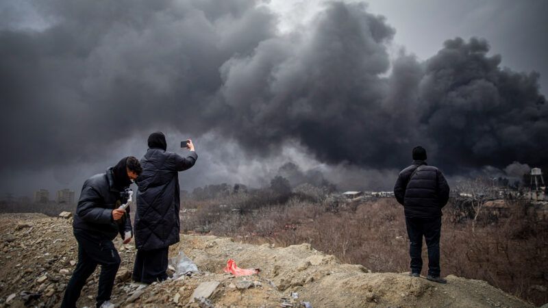 Plumes of smoke rise over the oil depot tanks hit by joint Israel-U.S. overnight in a station northwest of the capital in Tehran in Iran on Sunday, March 8, 2026. | str/UPI/Newscom