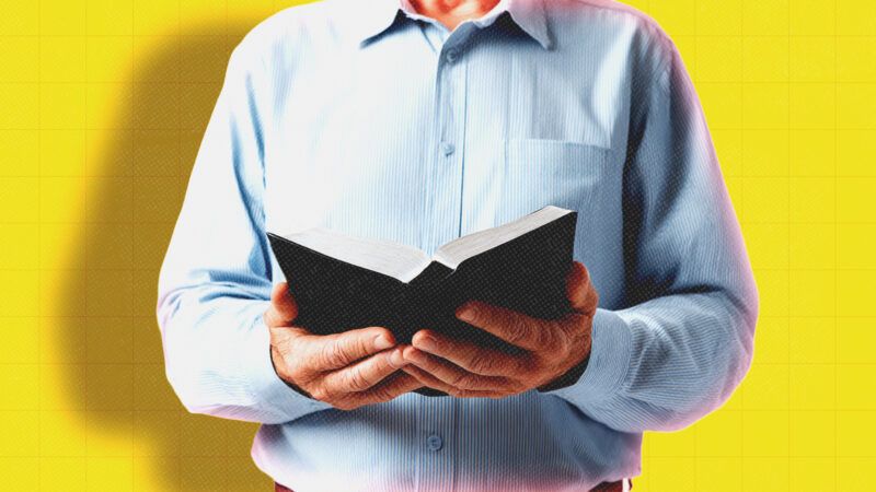 A man holding an open bible | Midjourney