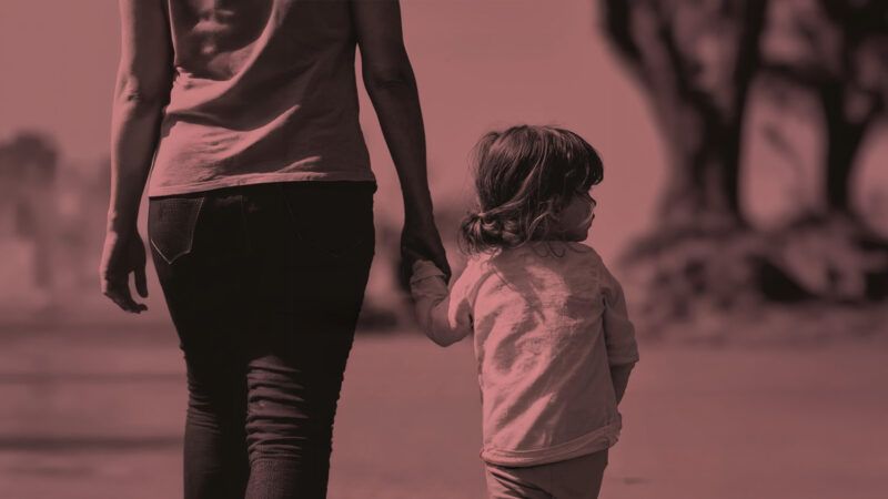 A mother holding the hand of her child | Princeton University Press