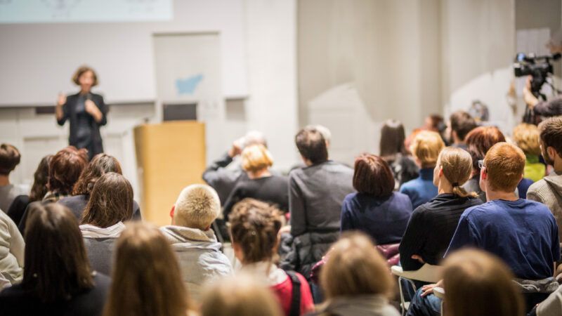 Students in a lecture hall | Photo: Kasto80/Dreamstime