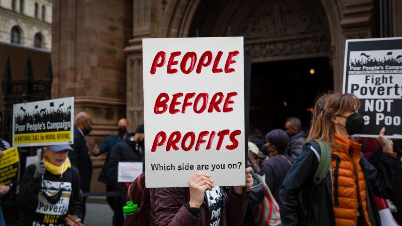 'People Before Profits' protest sign | Gina M Randazzo/ZUMAPRESS/Newscom