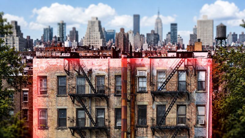 A rundown-looking apartment building is outlined in bright red—in the background is part of the New York City skyline. | Illustration: Adani Samat/ChatGPT. Photo: Ryan Deberardinis/Dreamstime