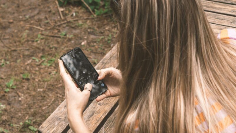 A teenager using a smartphone | Konrad Nowacki/Unsplash