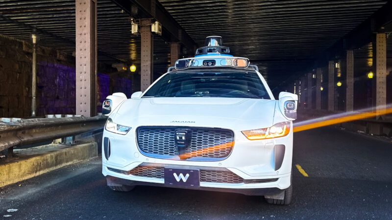A Waymo driverless vehicle drives through a tunnel | Tom Williams/CQ Roll Call/Newscom
