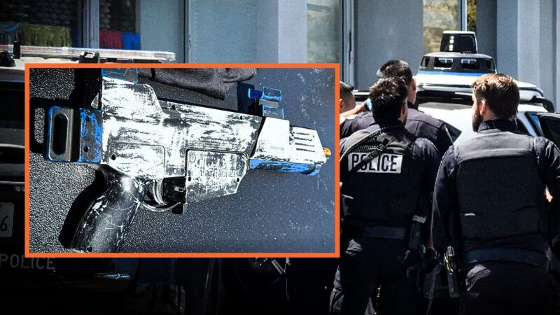 Toy gun and law enforcement officers outside a Waymo | Photo: San Mateo Police Department