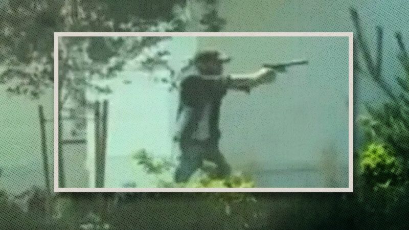 A grainy photo of a man in a hat aiming a gun. | Lane Koehn