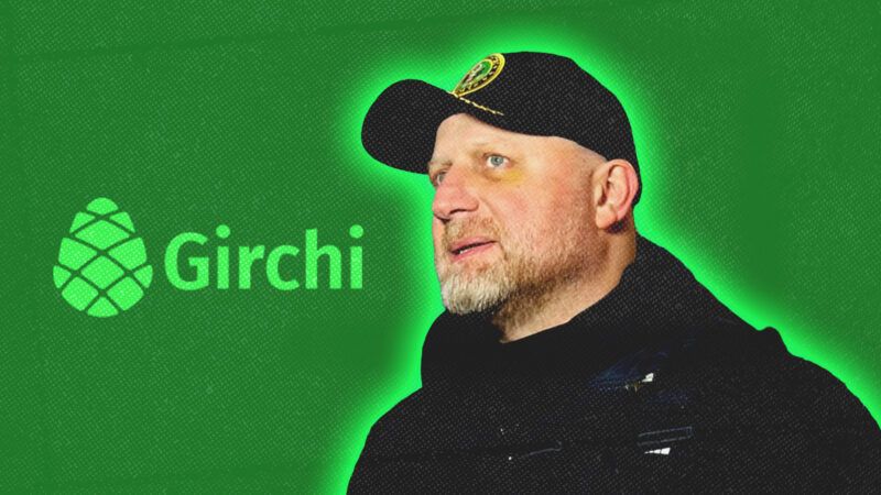 A man wearing black clothes and a blackc hat stands—he is outlined in lime green, with a darker green background photoshopped behind him, with a pine cone logo next to the word "Girchi." | Illustration: zurabjaparidze/Instagram/Girchi
