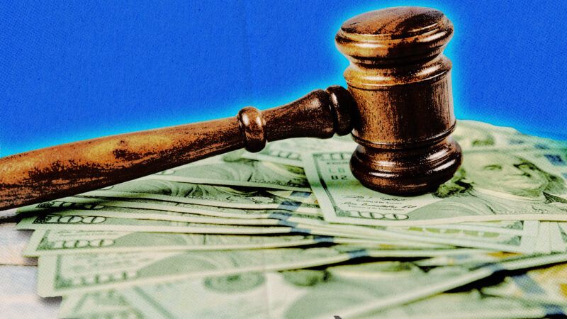 An illustration showing a gavel on top of a pile of $100 bills | Photo: Photovs/Dreamstime