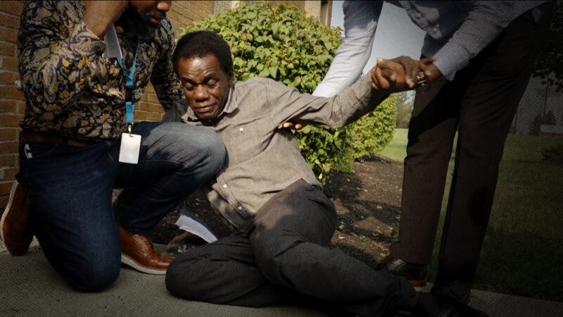 A Haitian national collapses after being fitted with an ankle monitor | Freedomnews.TV/@ScooterCasterNY/X
