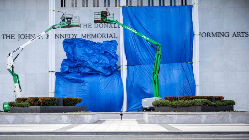 Construction lifts and tarps partially obscuring the Kennedy Center | Photo: Jim Watson/AFP/Getty Images