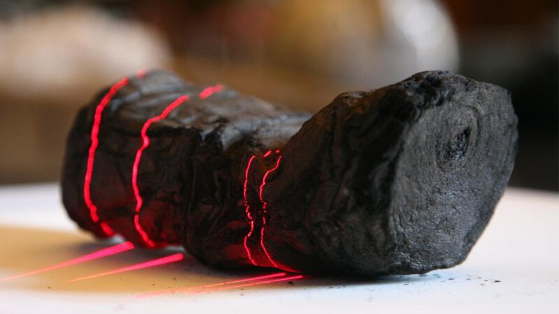 A charred scroll being scanned | Photo: Herculaneum scroll being scanned; EduceLab