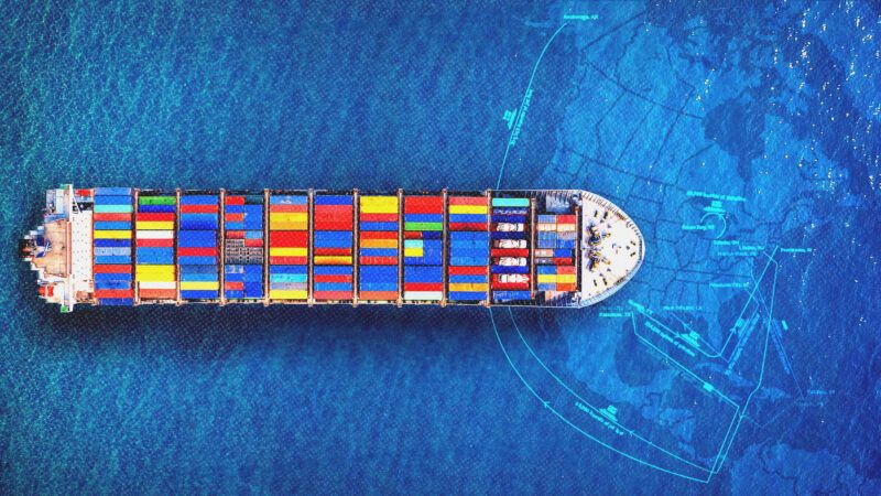 A large boat with shipping containers seen from above | Tawatchai Prakobkit/Dreamstime/Cato Institute