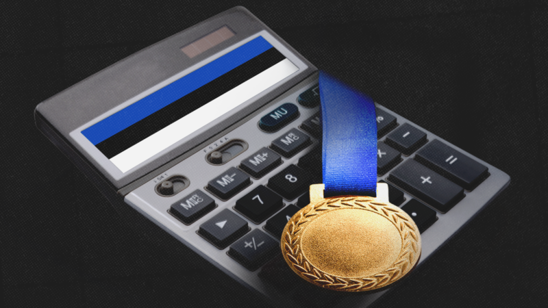 A gold medal on top of a calculator | BillionPhotos/maylim/Magnific/Mariam Zakaidze