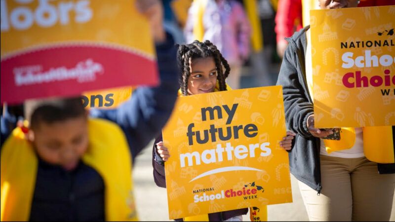 Kids hold education policy rally signs | School Choice Week/Instagram
