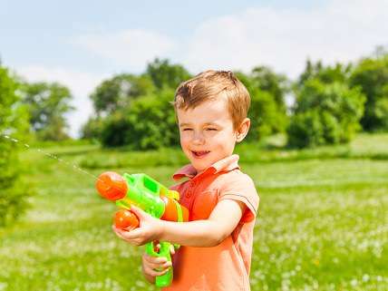 little boy with gun